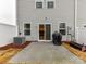 This image displays the back patio of a home with sliding glass doors and an AC unit at 1365 Eagle Claw Dr, Kannapolis, NC 28083