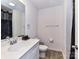 Clean bathroom with a toilet and single sink with modern finishes and hardware at 1365 Eagle Claw Dr, Kannapolis, NC 28083