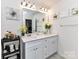 Bright bathroom featuring double sink vanity, quartz countertop, and modern lighting fixtures at 1365 Eagle Claw Dr, Kannapolis, NC 28083