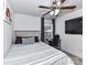 Cozy bedroom featuring a striped comforter and a desk next to the window at 1365 Eagle Claw Dr, Kannapolis, NC 28083