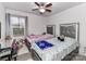 Bedroom featuring two beds with decorative headboards and playful decor by the window at 1365 Eagle Claw Dr, Kannapolis, NC 28083