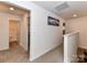 Upstairs hallway with carpet and railing to stairs, and artwork on the wall at 1365 Eagle Claw Dr, Kannapolis, NC 28083