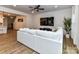 Comfortable living area with a plush sofa, large TV, and modern decor at 1365 Eagle Claw Dr, Kannapolis, NC 28083