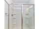 Bathroom featuring a stand-up shower with a glass door and integrated shelving at 1365 Eagle Claw Dr, Kannapolis, NC 28083
