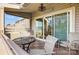 Enjoy lake views from this private balcony, complete with awning and patio furniture at 14021 Queens Harbor Rd, Charlotte, NC 28278