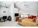 Upstairs bonus room functions as a comfortable bedroom, with vaulted ceiling and work area at 14021 Queens Harbor Rd, Charlotte, NC 28278