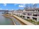 Beautiful waterfront condos featuring well-maintained landscaping and gorgeous water views, offering a serene living experience at 14021 Queens Harbor Rd, Charlotte, NC 28278