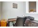 Cozy office space features natural light, dark desk and filing cabinet at 14021 Queens Harbor Rd, Charlotte, NC 28278