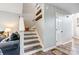 View of stairway with wood and white accents and decor at 14021 Queens Harbor Rd, Charlotte, NC 28278