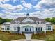 Exterior shot of the clubhouse highlighting its elegant architectural details and welcoming entrance at 2022 Mantle Ridge Dr, Indian Trail, NC 28079