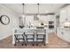Modern kitchen featuring island with seating, pendant lighting, and stainless appliances at 2022 Mantle Ridge Dr, Indian Trail, NC 28079
