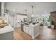 Open concept kitchen featuring island sink, stainless appliances and view to living space at 2022 Mantle Ridge Dr, Indian Trail, NC 28079