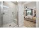 Main bathroom with tiled shower and view of main bedroom at 2022 Mantle Ridge Dr, Indian Trail, NC 28079