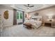 Spacious main bedroom with tray ceiling, accent wall, and ample natural light at 2022 Mantle Ridge Dr, Indian Trail, NC 28079