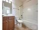 Bathroom featuring a vanity, toilet, and a shower/tub with tile flooring at 2023 Moultrie Ct, Fort Mill, SC 29707