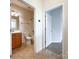 Bathroom with a vanity and tile flooring connected to the toilet and shower/tub at 2023 Moultrie Ct, Fort Mill, SC 29707