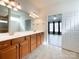 Bathroom featuring a large double sink vanity with a view into the living room space at 2023 Moultrie Ct, Fort Mill, SC 29707