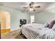 Cozy bedroom features neutral paint, a ceiling fan, and an ensuite bathroom at 2232 Mancke Dr, Rock Hill, SC 29732
