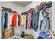 Walk-in closet featuring wire shelving, hanging clothes, and floor storage at 2232 Mancke Dr, Rock Hill, SC 29732
