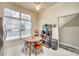 Breakfast nook area with natural light from the window, featuring a ceiling fan, round table, and chairs at 2232 Mancke Dr, Rock Hill, SC 29732