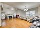 Spacious living room boasts high ceilings, hardwood flooring, a fireplace, and ample natural light at 2232 Mancke Dr, Rock Hill, SC 29732