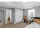 Bedroom with carpet and an open view of the adjacent hallway at 233 Proctor St, Gastonia, NC 28052