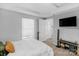 Clean bedroom with neutral walls and a view to the exterior and interior at 233 Proctor St, Gastonia, NC 28052