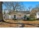 Charming single Gathering home with a quaint front porch and well-maintained yard at 233 Proctor St, Gastonia, NC 28052