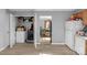 Laundry area featuring a washing machine, dryer, and a view to the living room at 233 Proctor St, Gastonia, NC 28052