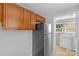 View of the laundry room featuring a washer and dryer set just off the kitchen at 233 Proctor St, Gastonia, NC 28052