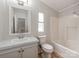 Neutral bathroom features a single vanity and a tub and shower combo at 236 Sailwinds Rd, Mooresville, NC 28115
