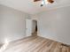 Well-lit bedroom with ample space, ceiling fan, and connecting doorway at 236 Sailwinds Rd, Mooresville, NC 28115