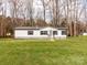 Charming single-story home with well-maintained lawn and classic white siding at 236 Sailwinds Rd, Mooresville, NC 28115