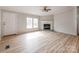 Bright living room with a cozy fireplace and ample natural light at 236 Sailwinds Rd, Mooresville, NC 28115