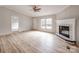 Spacious living room featuring a fireplace and contemporary flooring at 236 Sailwinds Rd, Mooresville, NC 28115