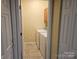 Convenient laundry room with washer and dryer, located near other rooms for easy access and functionality at 2656 Polo Club Blvd, Matthews, NC 28105
