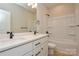 Bathroom with double sink vanity, and tub with tile walls at 268 Lytton Farm Rd, Troutman, NC 28166