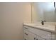 Elegant powder room featuring a modern vanity with quartz countertop and sleek black fixtures at 268 Lytton Farm Rd, Troutman, NC 28166