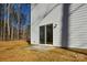View of home exterior with siding and glass sliding door at 268 Lytton Farm Rd, Troutman, NC 28166