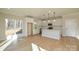 Modern kitchen with white cabinets, a center island, and stainless steel appliances at 268 Lytton Farm Rd, Troutman, NC 28166