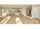 Spacious living area featuring light wood floors, ample natural light, and open-concept design at 268 Lytton Farm Rd, Troutman, NC 28166