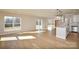 Open floor plan combines living, dining, and kitchen with large windows at 268 Lytton Farm Rd, Troutman, NC 28166