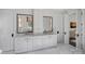 Elegant bathroom featuring double vanities with marble countertops and ample storage at 3212 Lazy Branch Rd, Charlotte, NC 28270