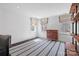 Spacious bedroom with three windows providing natural light and hardwood floors at 3212 Lazy Branch Rd, Charlotte, NC 28270