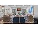 Spacious living room with fireplace, coffered ceilings, and comfortable seating areas at 3212 Lazy Branch Rd, Charlotte, NC 28270