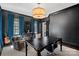 Stylish office with dark accent wall, large windows, and comfortable seating at 3212 Lazy Branch Rd, Charlotte, NC 28270