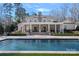 A luxurious pool with a spacious backyard, perfect for outdoor entertaining and relaxation at 3212 Lazy Branch Rd, Charlotte, NC 28270