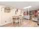 Finished basement with a dining area, hardwood floors, and light walls at 3929 Wexford Ln, Denver, NC 28037