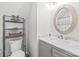 Bathroom with a white vanity, marble countertop, and silver hardware at 3929 Wexford Ln, Denver, NC 28037