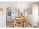 Formal dining room with seating for six and an elegant chandelier at 3929 Wexford Ln, Denver, NC 28037